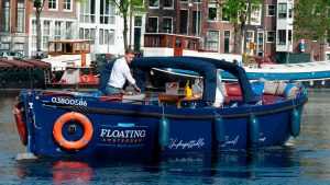 Home Luxe privé rondvaart Amsterdam langs culturele hoogtepunten met gezelschap aan boord